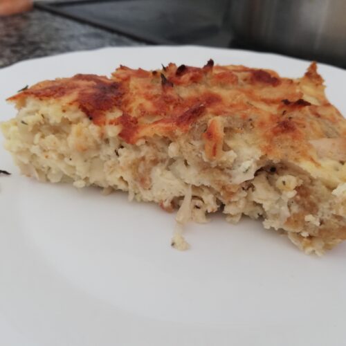 a slice of breakfast casserole with chicken and sweet potatoes