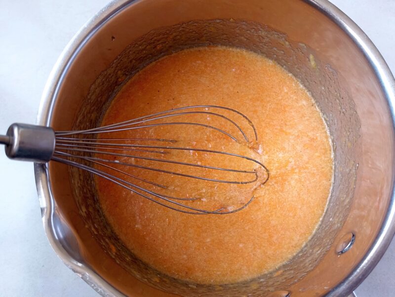 Combining wet ingredients and sugar for sourdough pumpkin muffins