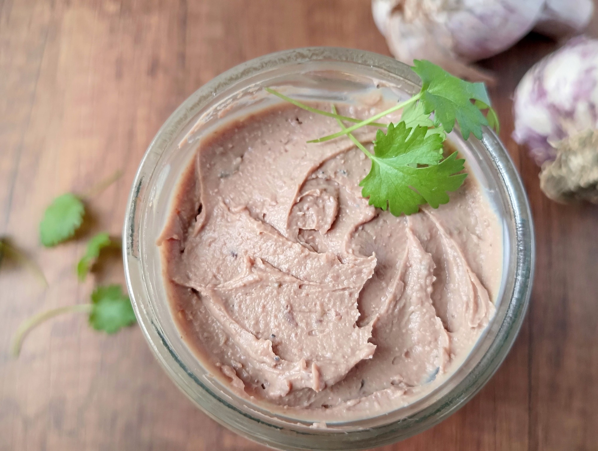 How to make chicken liver pâté: chicken liver pâté in jar on wooden table
