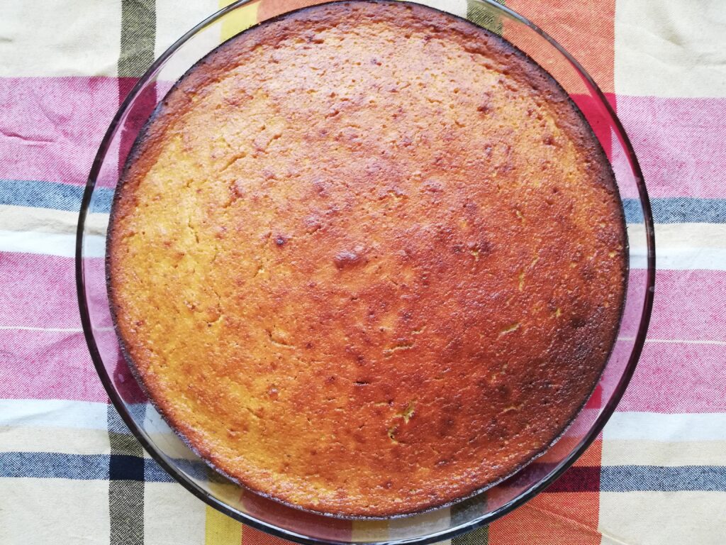 baked crustles pumpkin pie on a checkered tea towel