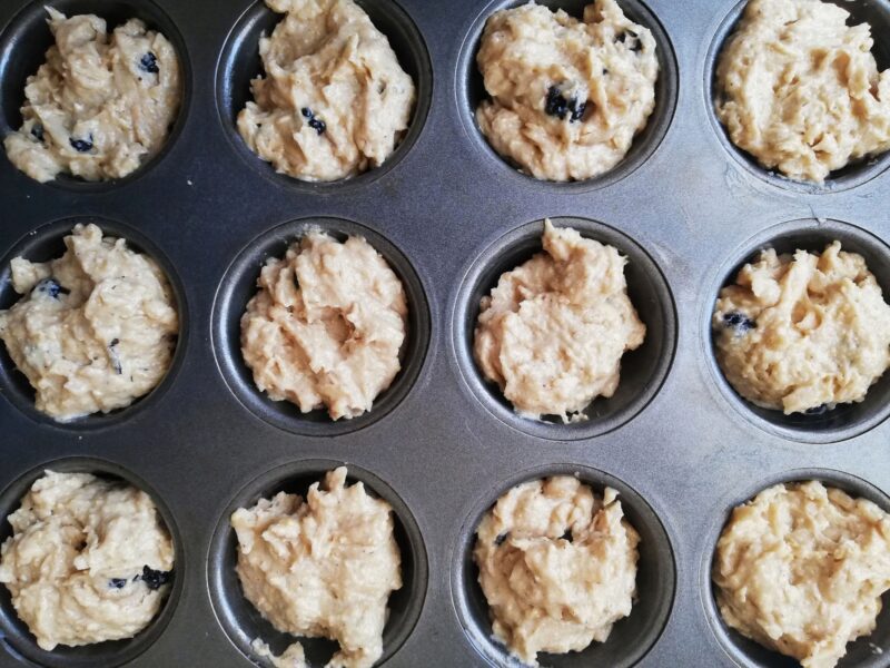 Filling muffin cups with muffin batter