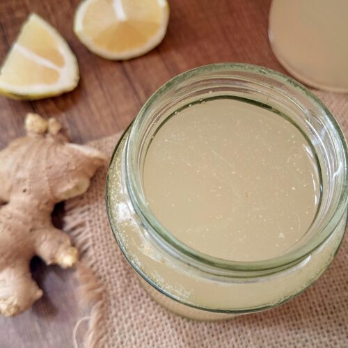 Ginger bug starter in jar on burlap