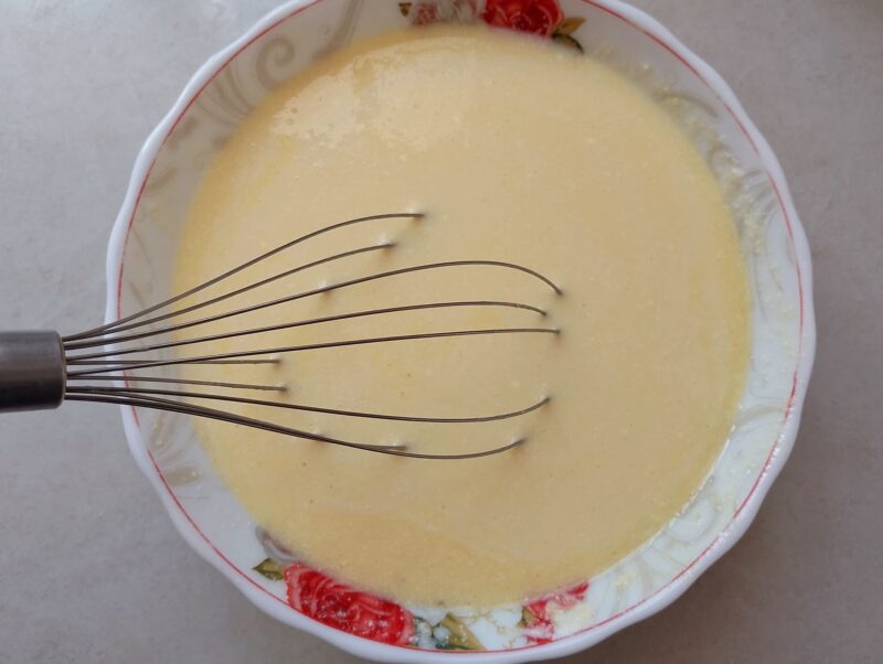 Whisk egg custard in bowl