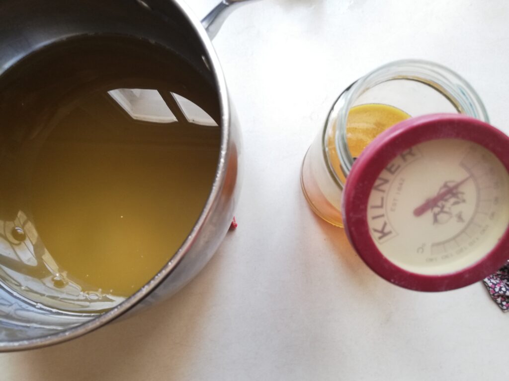 Waiting for the melted fats and the lye solution to cool and equalize in temperature