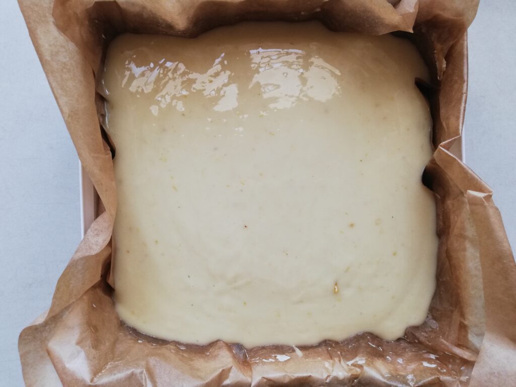 Chamomile soap poured into the mold lined with baking paper