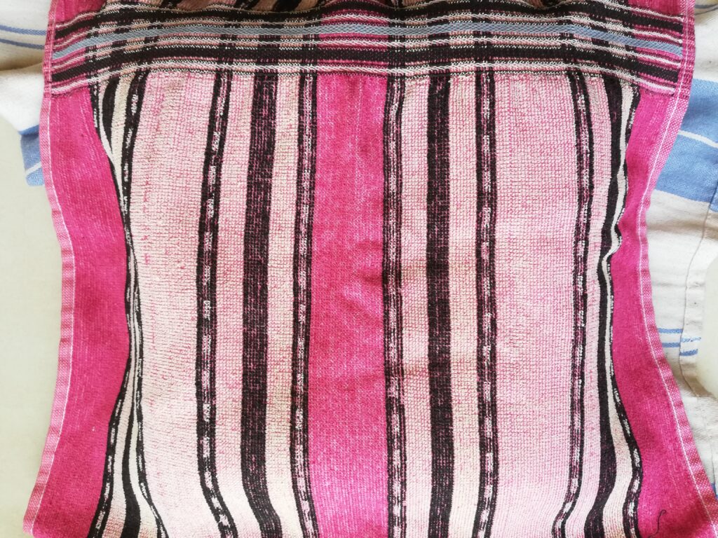 Colc process chamomile soap curing in the mold covered with towels to keep it warm