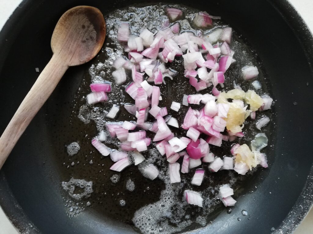 Onions and garlic being sauteed n butter 