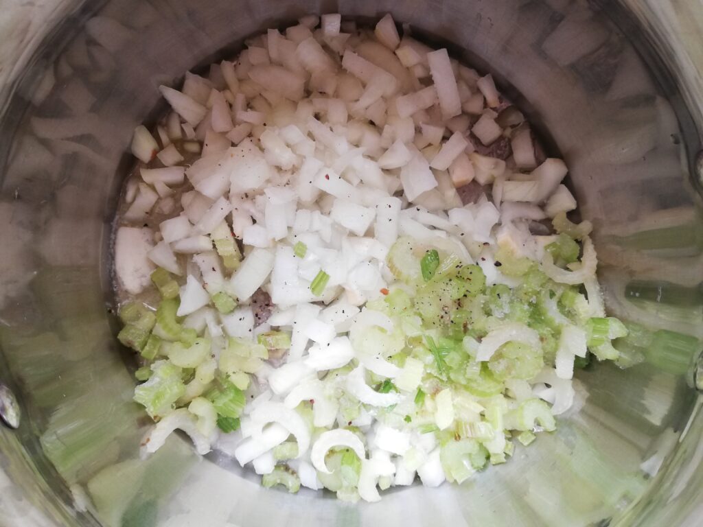 Onions and celery sauteing in butter