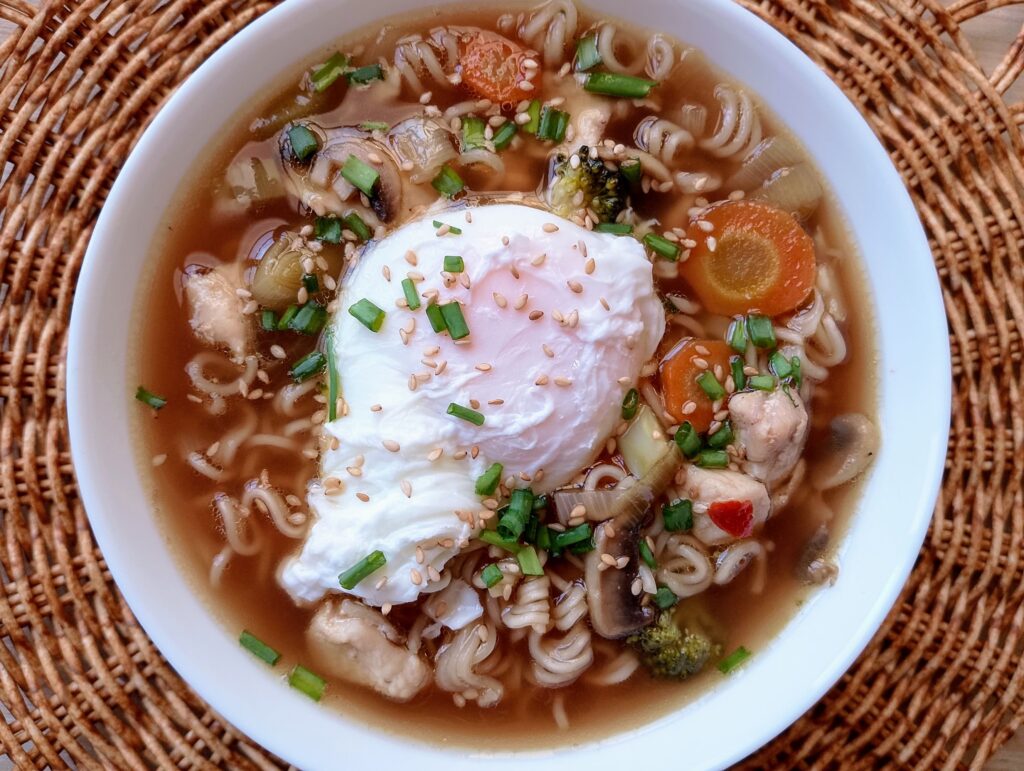Chinese noodle soup served in a bowl with a garnish of green onions