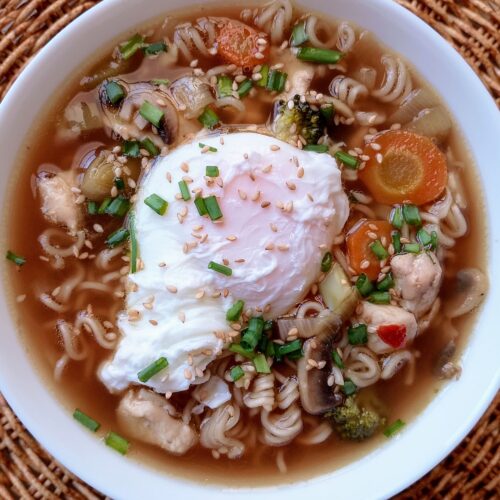 Chinese noodle soup served in a bowl garnished with green onions