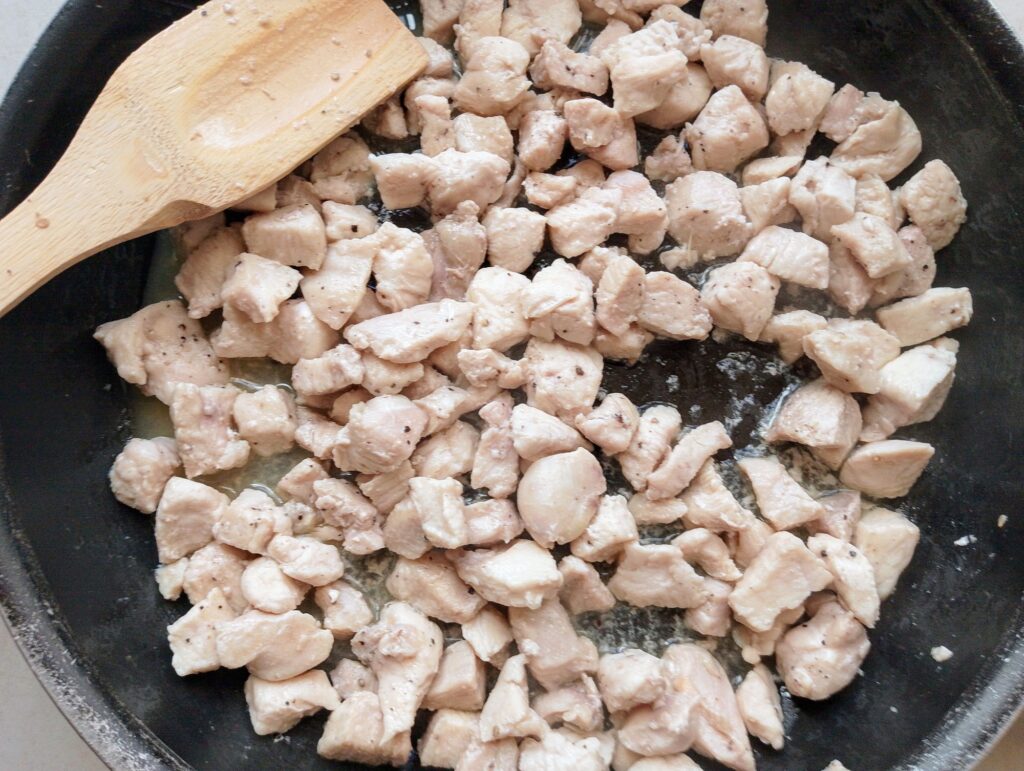 Sauteing cubed chicken breast for the from scratch Chinese noodle soup
