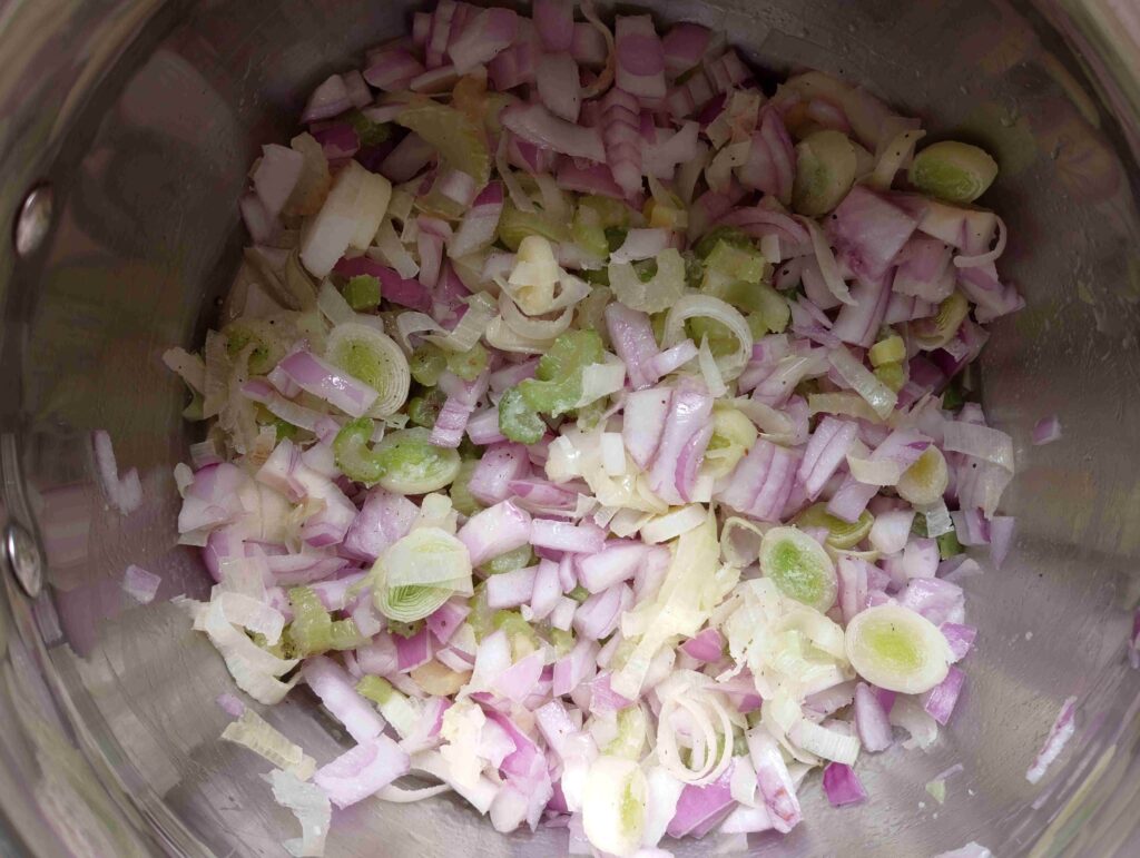 Sauteing onions, celery and leeks in butter