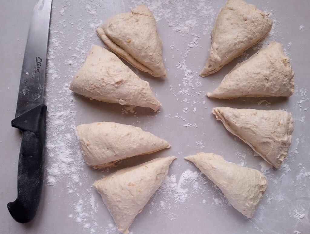 Dividing the dough into eight even pieces