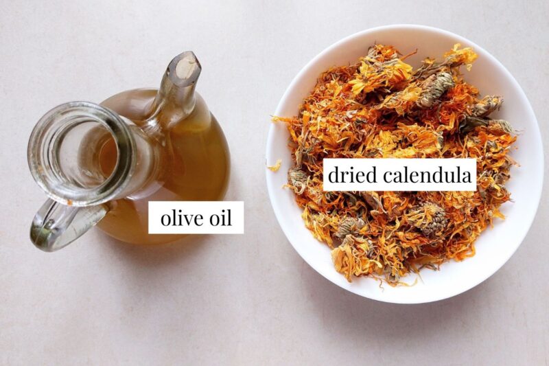 Ingredients for making calendula oil on counter