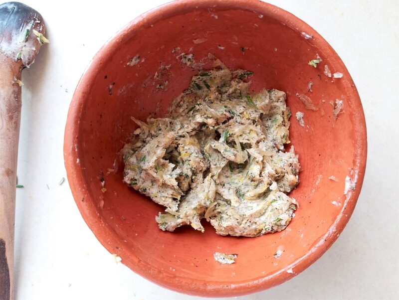 Mixing chicken marinade ingredients in a bowl