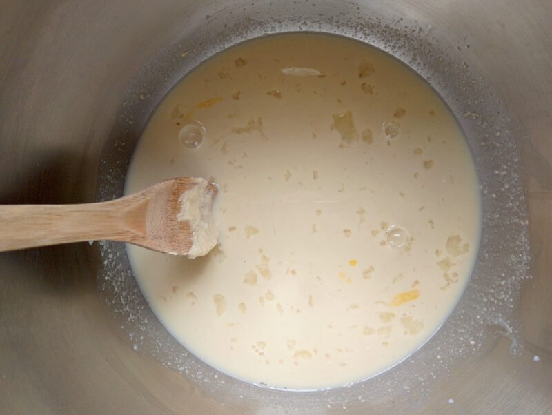 Mixing the wet ingredients for sourdough discard burger buns