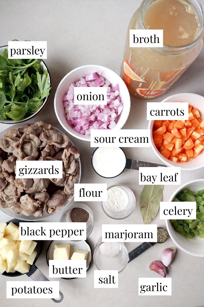 Ingredients for chicken gizzard soup recipe arranged on counter