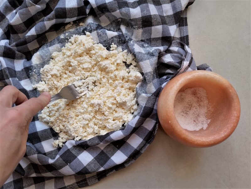 Mixing salt into the finished raw milk farmer's cheese