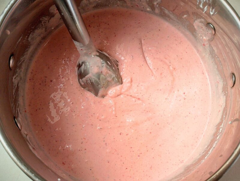 Blending smoothie bowl ingredients with a stick blender
