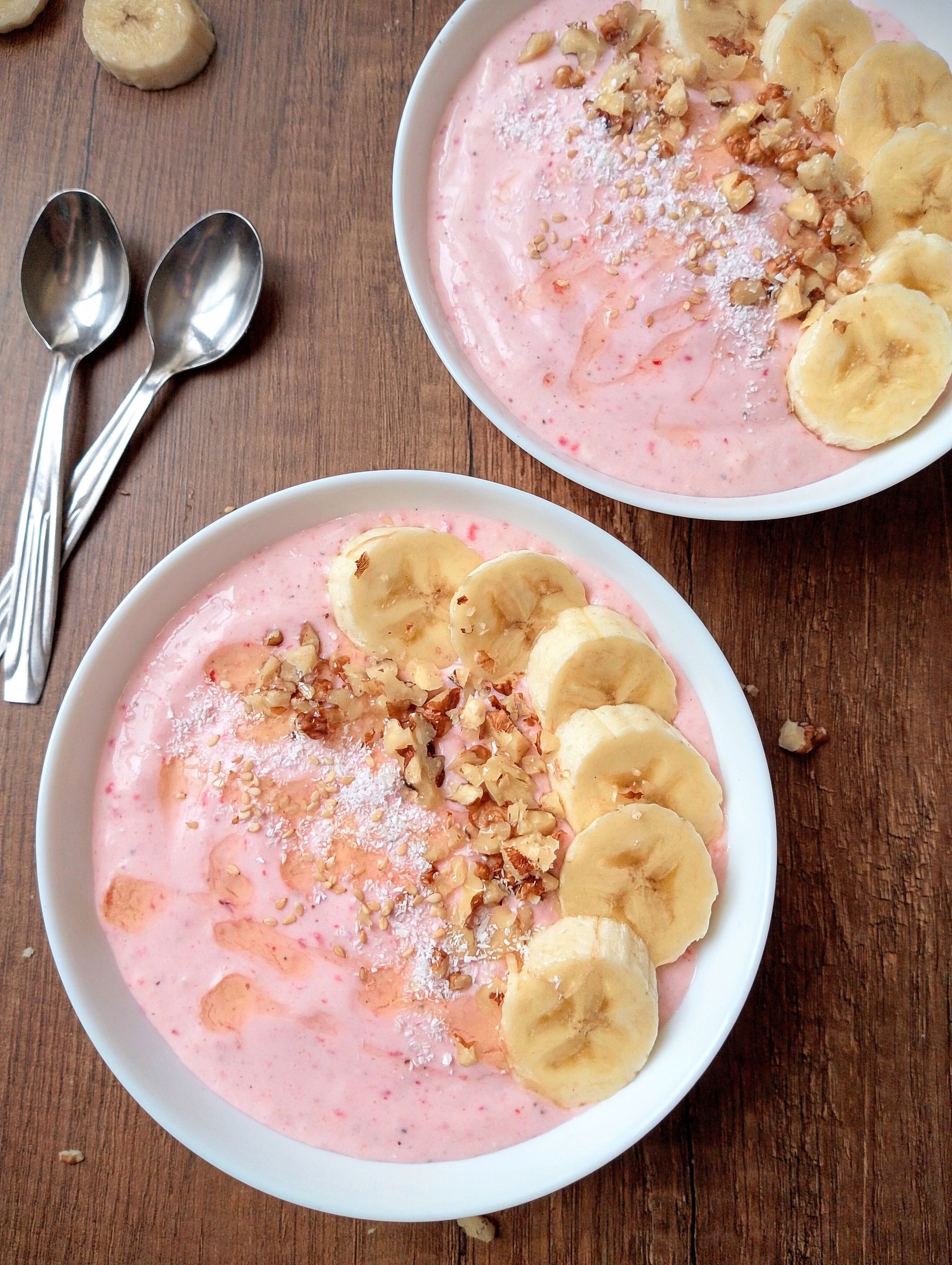 Smoothie bowls on wooden table