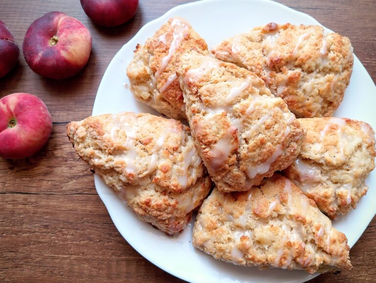 Peaches and cream sourdough discard scones on white serving plate
