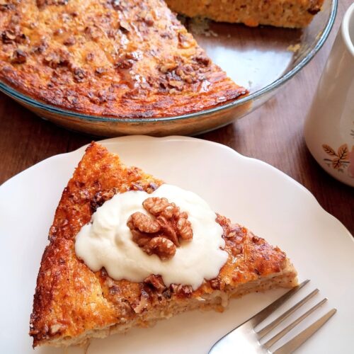 A slice of pumpkin cottage cheese breakfast bake on serving plate