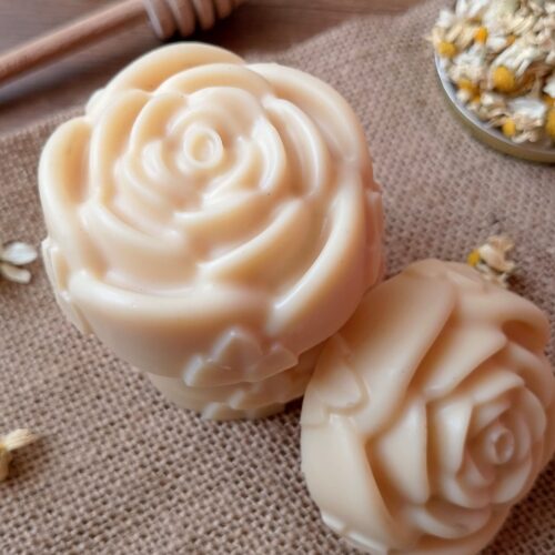 Tallow lotion bars stacked on burlap sack