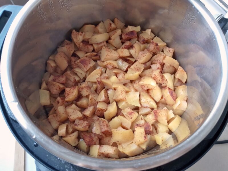 Cooked apples in Instant Pot, ready to be blended into applesauce