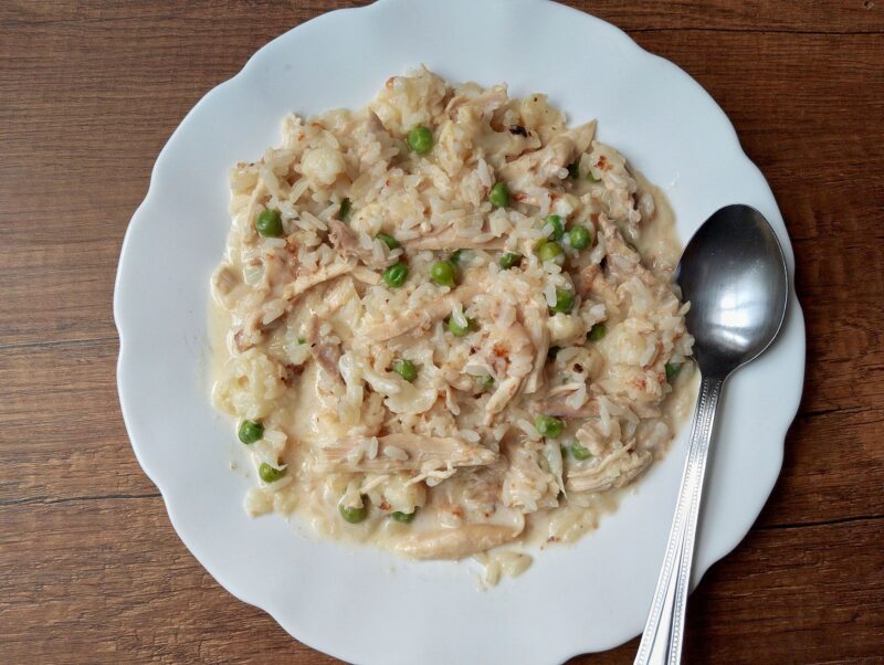 Rice with leftover roast chicken and cauliflower on plate